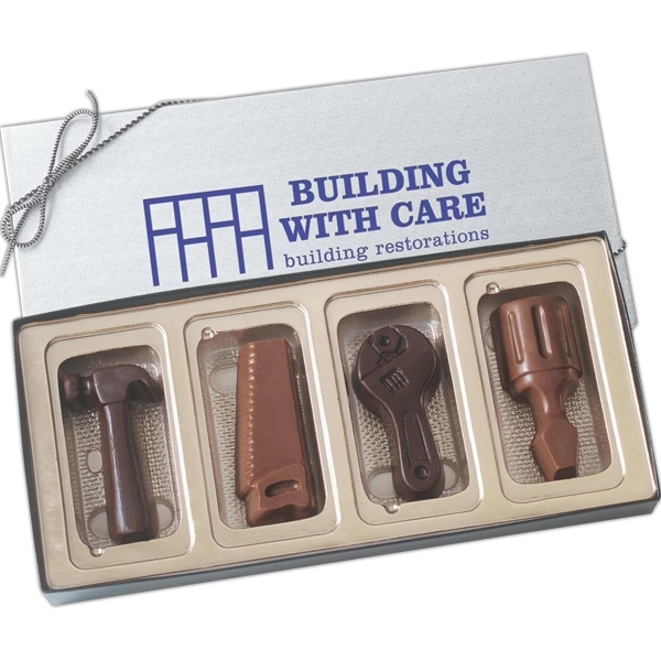Four tool shapes molded chocolates in gift box