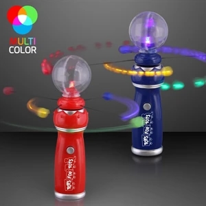 Orbiting LED toy wand with crystal ball